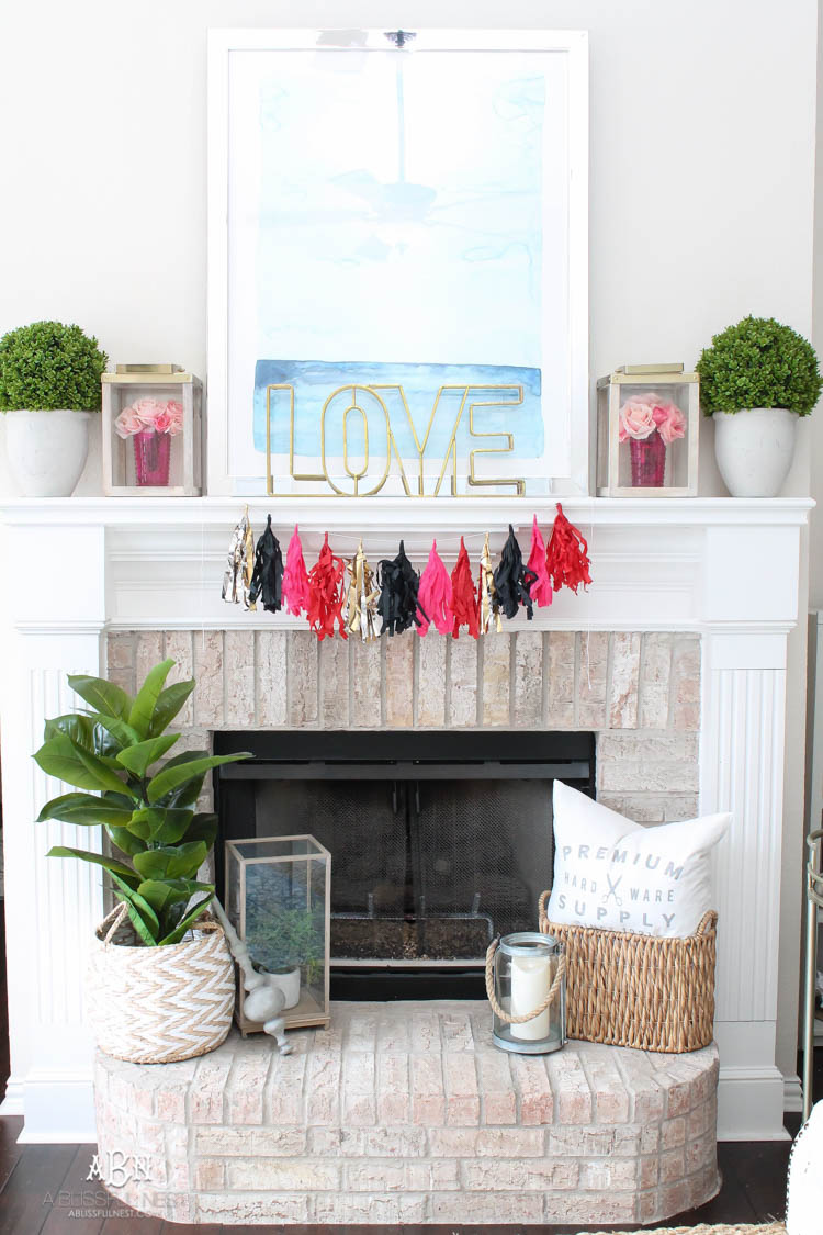 Love this modern look for a Valentine's Day mantle decor! Super easy to recreate with links to all the products. See more on https://ablissfulnest.com/ #valentinesday #valentinesdaydecor