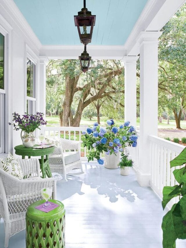 Just love the gorgeous turquoise color of the ceiling of this spring front porch! 
