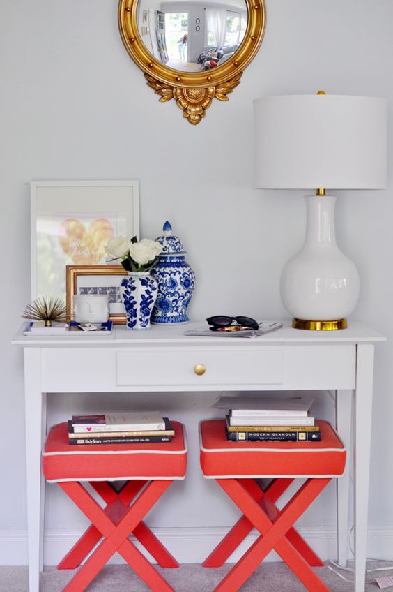 Easy ways to style a console table by adding height, seating, and accessories. for more ideas go to www.ablissfulnest.com #interiors #tips