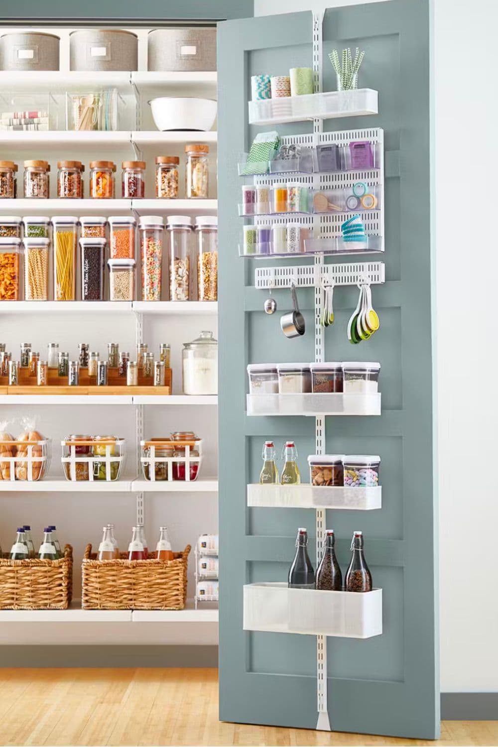 A metal organizer with shelves mounted to the inside of a pantry door to store items.