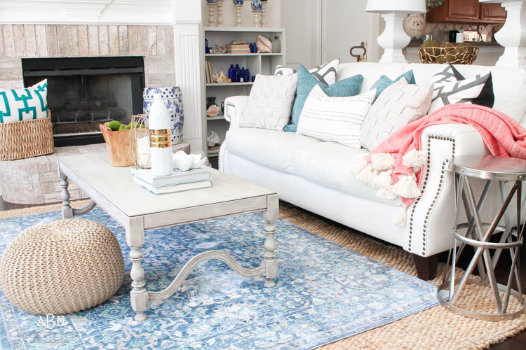 It's time to redecorate for spring! Love this fresh and inviting spring living room! See more on https://ablissfulnest.com/ #springdecorating #livingroom