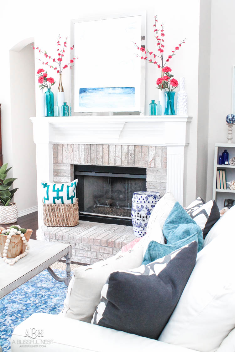 It's time to redecorate for spring! Love this fresh and inviting spring living room! See more on https://ablissfulnest.com/ #springdecorating #livingroom