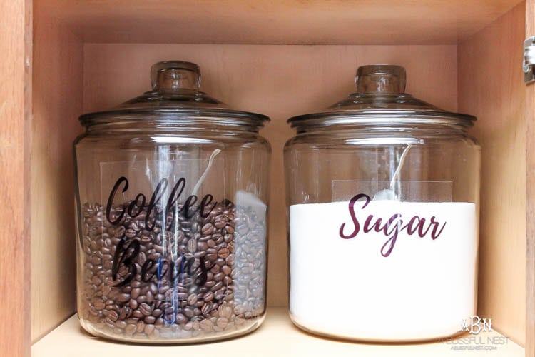 This is such a great idea! Transform a dead cabinet space with these coffee cabinet organization ideas! See more on https://ablissfulnest.com/ #coffee #coffeestation