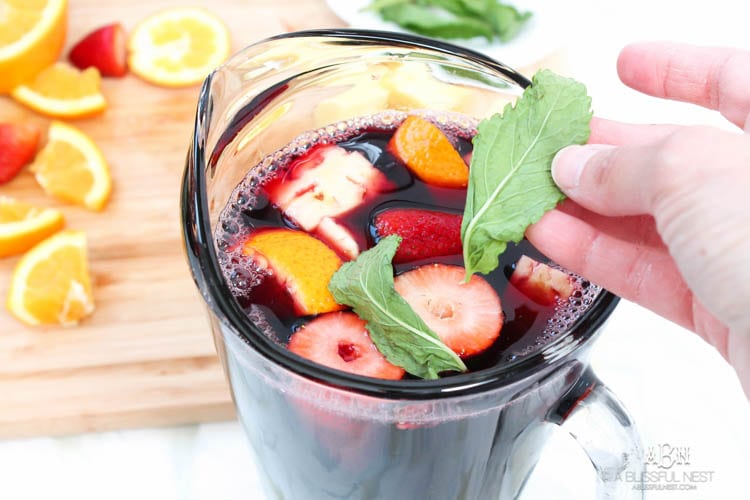 This is such a delicious sangria drink recipe celebrating Girl's Night In and the release of Fifty Shades Darker movie on dvd! See more on https://ablissfulnest.com/ #ad #drinkrecipe #FiftyShadesDarker