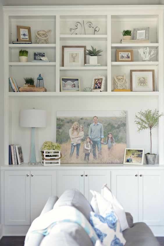 Create a family friendly living room that is still stylish yet kid friendly, head over to https://ablissfulnest.com/ for all the tips! #interiors #livingrooms #kidspaces