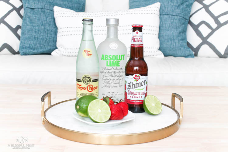 This is such a delicious beer cocktail recipe! Love the mix of strawberries and lime. See more on https://ablissfulnest.com/ #ad #totalwine #cocktailrecipe