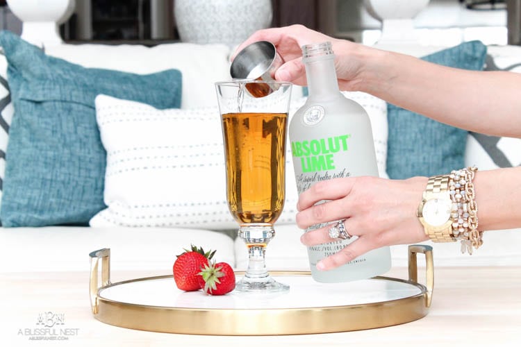 This is such a delicious beer cocktail recipe! Love the mix of strawberries and lime. See more on https://ablissfulnest.com/ #ad #totalwine #cocktailrecipe