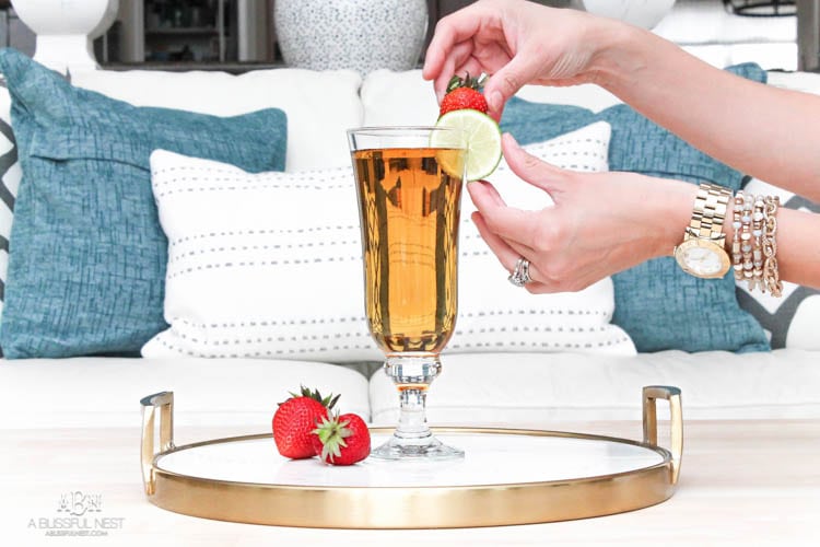 This is such a delicious beer cocktail recipe! Love the mix of strawberries and lime. See more on https://ablissfulnest.com/ #ad #totalwine #cocktailrecipe