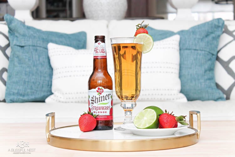 This is such a delicious beer cocktail recipe! Love the mix of strawberries and lime. See more on https://ablissfulnest.com/ #ad #totalwine #cocktailrecipe