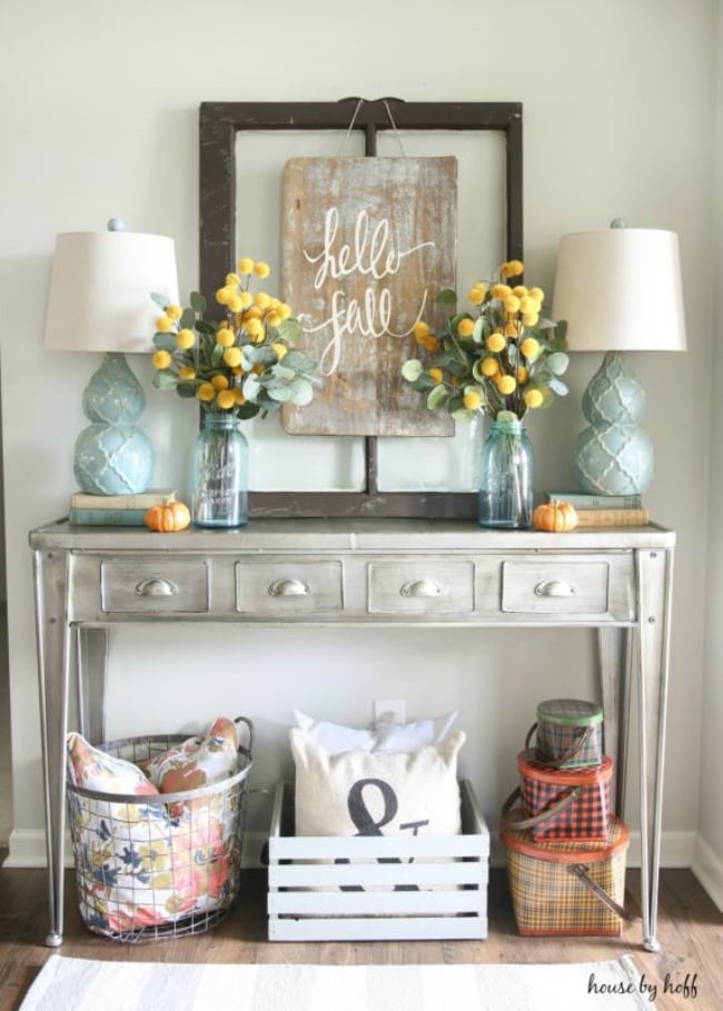Adore this fall entryway by House by Hoff. Grab the best fall entryway ideas on https:ablissfulnest.com/ #falldecor #falldecorating #fallentrydecor