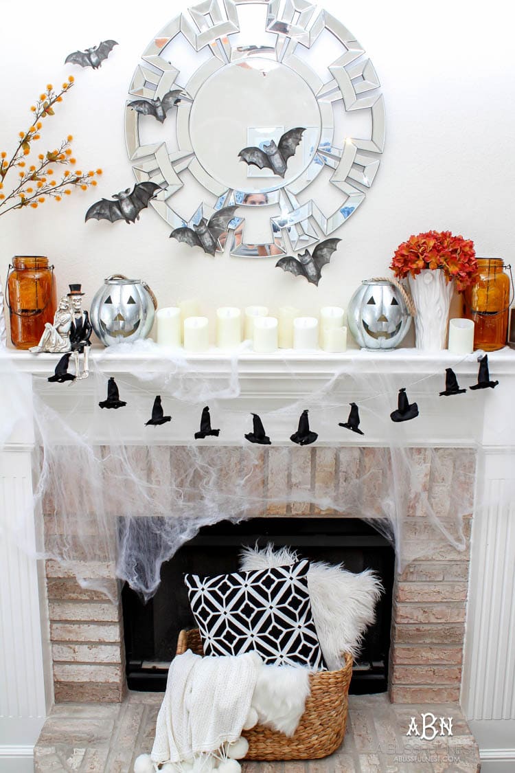 5 tried and true Halloween mantle ideas for a timeless spooky display! #halloween #halloweenideas #halloweendecor #ad #TuesdayMorning