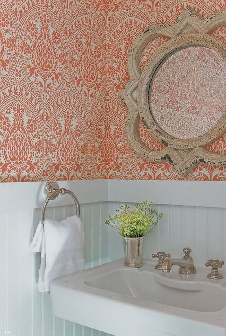 Simple tips on how to decorate with orange, from adding pops of pillows to wallpaper are on the blog, head over to https://ablissfulnest.com #interiordesign #designtips #popofcolor