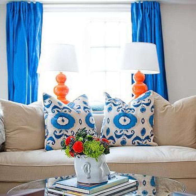 Simple tips on how to decorate with orange, from adding pops of pillows to wallpaper are on the blog, head over to https://ablissfulnest.com #interiordesign #designtips #popofcolor #paintcolors