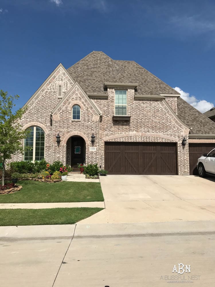 If you're trying to decide how to choose brick for your home, try driving around your neighborhood to find some inspiration! I love the way the exterior finish of this brick home looks!