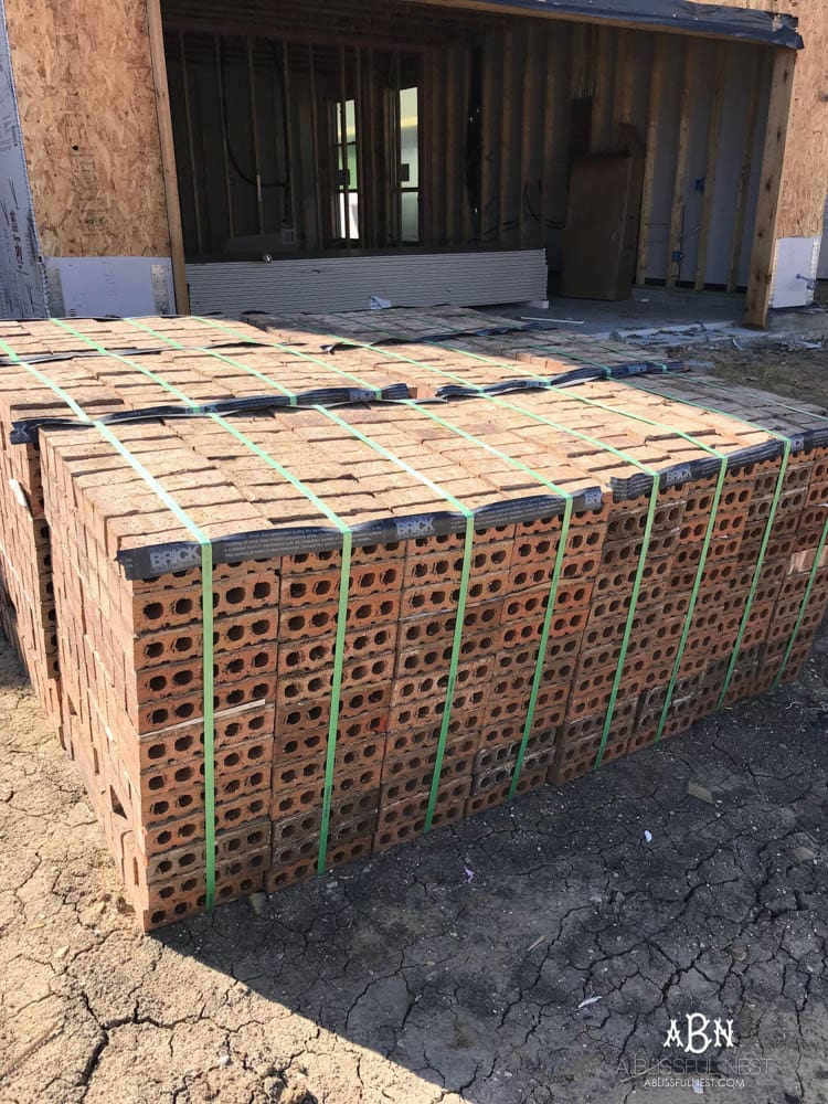 All of these pallets of brick will come together to make the exterior of our new home look amazing! Struggling with how to choose brick for your home? You have so many options - here's where to start!