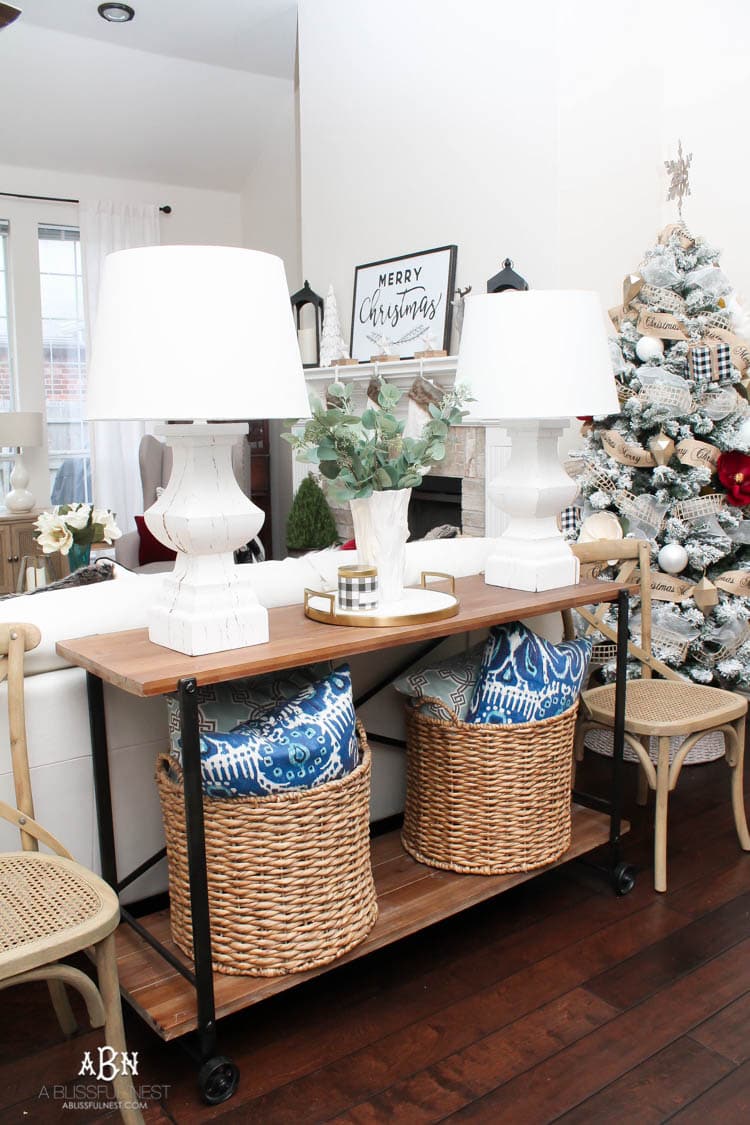 Love the black and white touches with red in this gorgeous Christmas Home Tour! See more on https://ablissfulnest.com/ #ad #kirklands #christmasdecor #christmashometour #christmasdecorating #christmastree #christmasentry