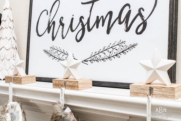 Love the black and white touches with red in this gorgeous Christmas Home Tour! See more on https://ablissfulnest.com/ #ad #kirklands #christmasdecor #christmashometour #christmasdecorating #christmastree #christmasentry 