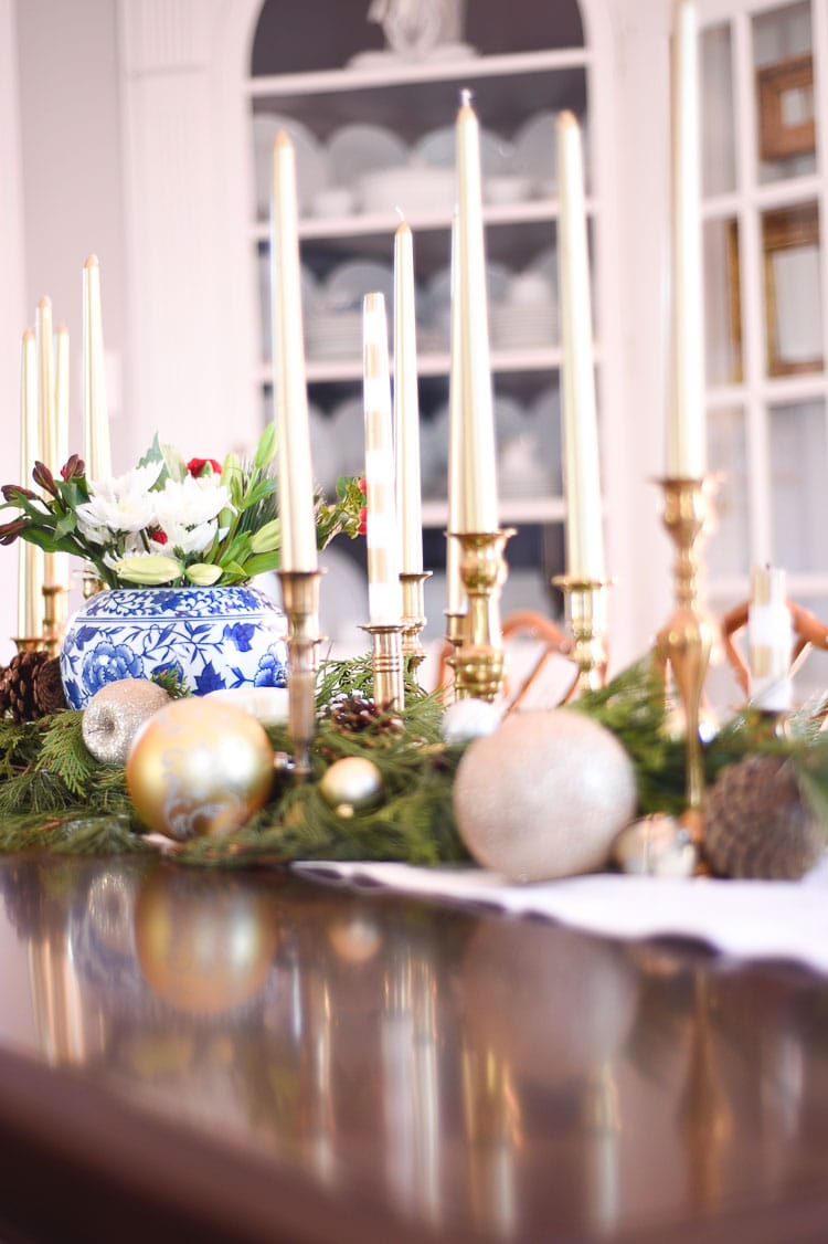 How to style your holiday table and mantel with vintage inspired holiday décor pieces, for more visit https://ablissfulnest.com #holidaydecor #holidaytablescape #holidaymantel