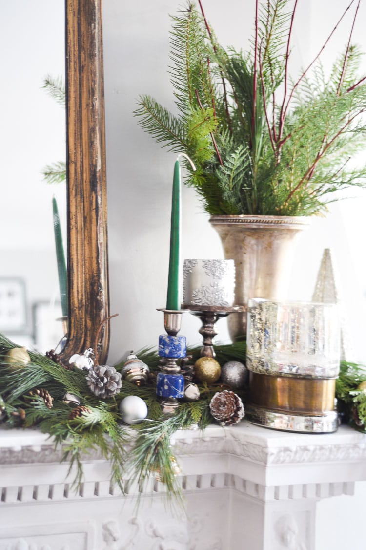 How to style your holiday table and mantel with vintage inspired holiday décor pieces, for more visit https://ablissfulnest.com #holidaydecor #holidaytablescape #holidaymantel