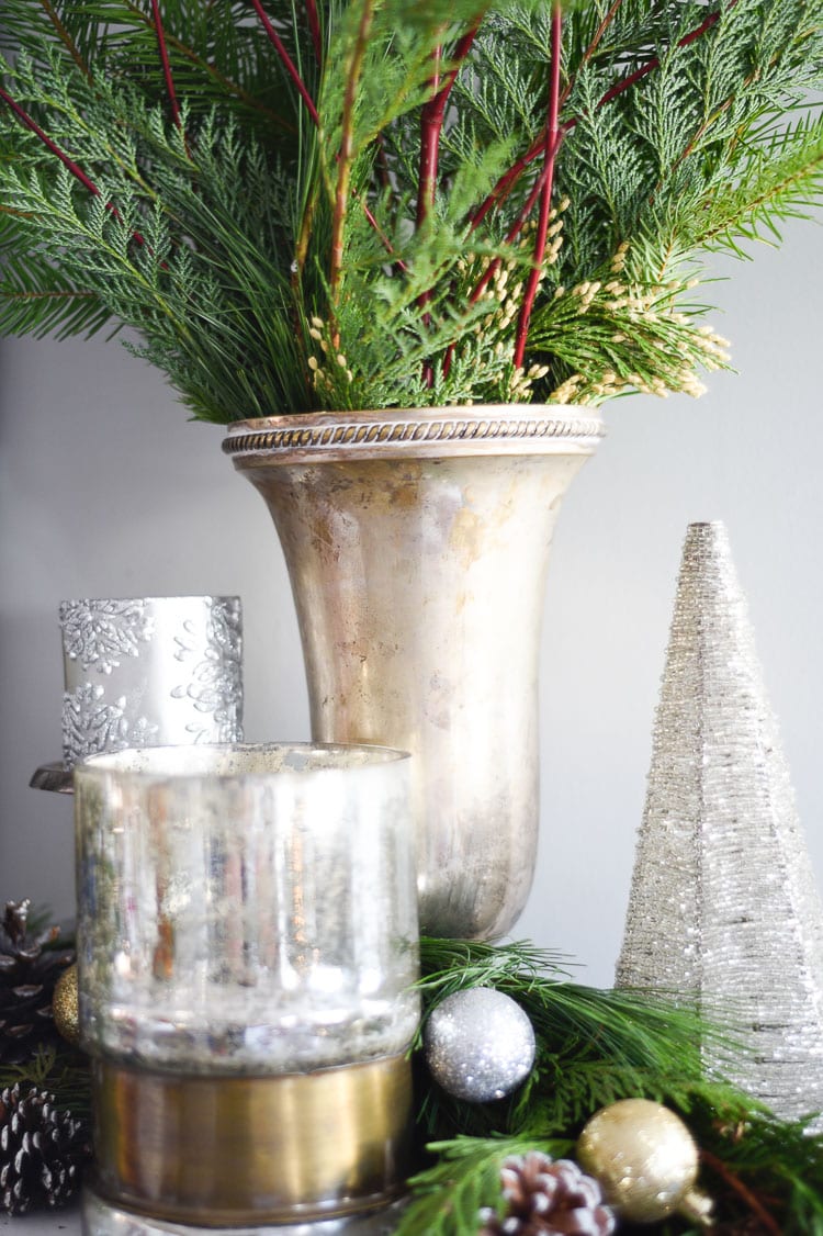 How to style your holiday table and mantel with vintage inspired holiday décor pieces, for more visit https://ablissfulnest.com #holidaydecor #holidaytablescape #holidaymantel