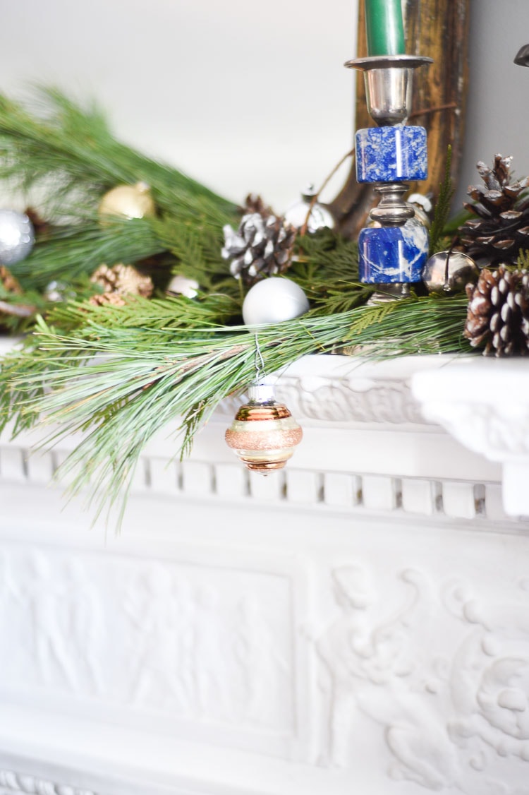 How to style your holiday table and mantel with vintage inspired holiday décor pieces, for more visit https://ablissfulnest.com #holidaydecor #holidaytablescape #holidaymantel