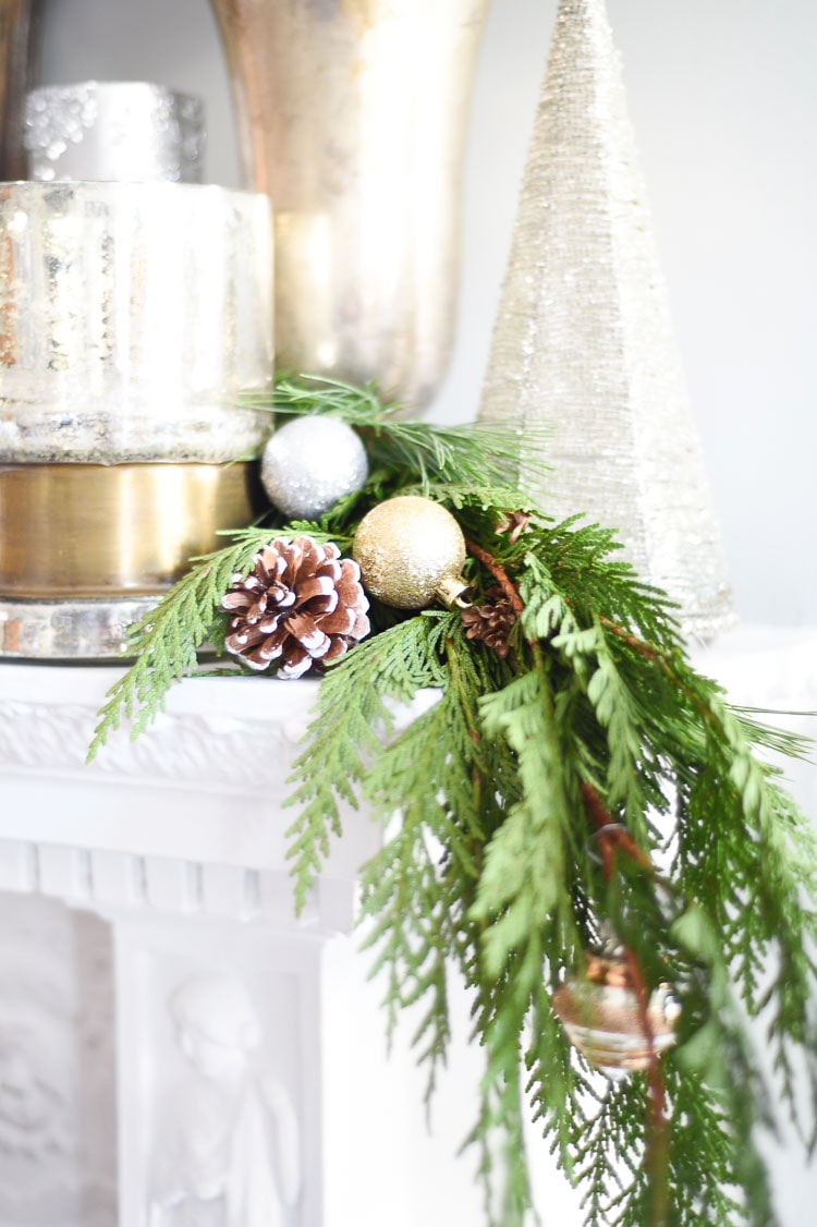 How to style your holiday table and mantel with vintage inspired holiday décor pieces, for more visit https://ablissfulnest.com #holidaydecor #holidaytablescape #holidaymantel