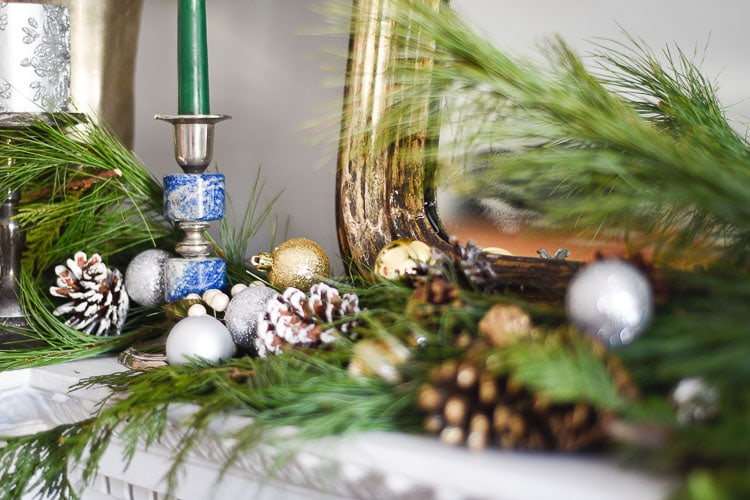 How to style your holiday table and mantel with vintage inspired holiday décor pieces, for more visit https://ablissfulnest.com #holidaydecor #holidaytablescape #holidaymantel