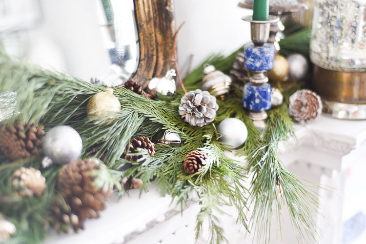 How to style your holiday table and mantel with vintage inspired holiday décor pieces, for more visit https://ablissfulnest.com #holidaydecor #holidaytablescape #holidaymantel