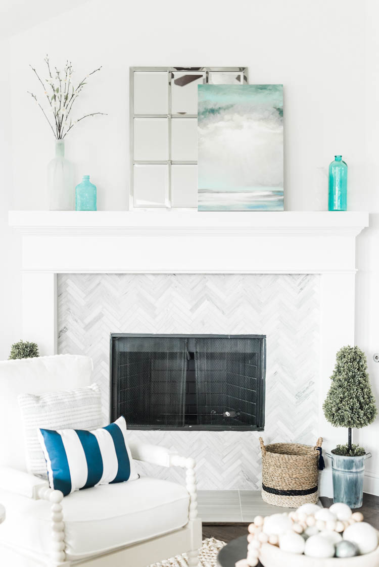 Spring touches with a coastal vibe. #ad #AthomeStores #springdecorating #springdecoratingideas #coastallivingroom