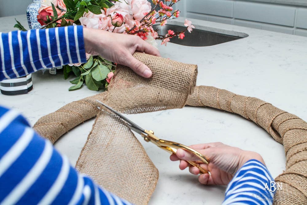 Easy steps to make this gorgeous peony flower wreath. #springwreath #diytutorial #flowerwreath #wreathtutorial