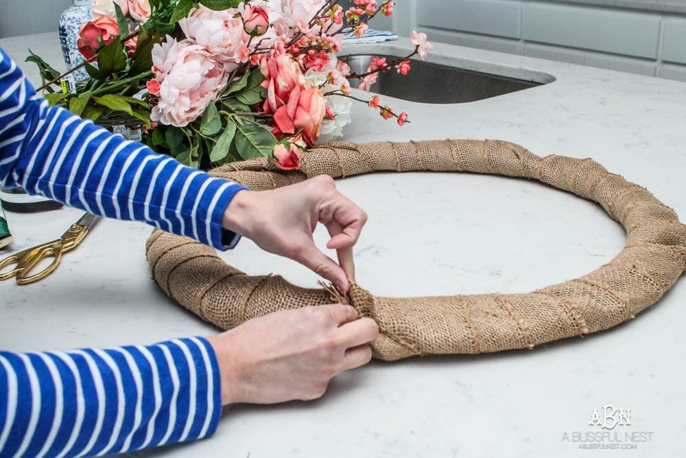 Easy steps to make this gorgeous peony flower wreath. #springwreath #diytutorial #flowerwreath #wreathtutorial