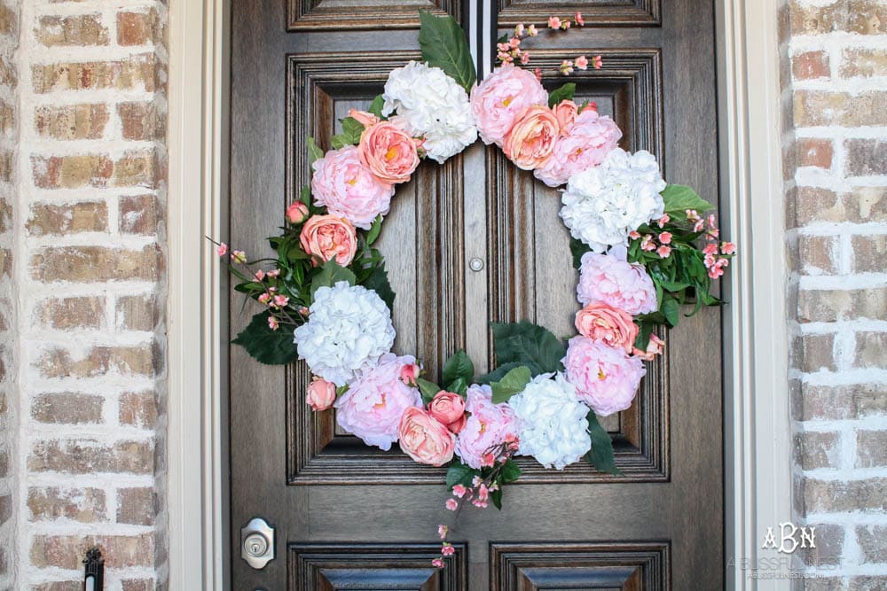 Easy steps to make a peony spring wreath. #springwreath #ditutorial