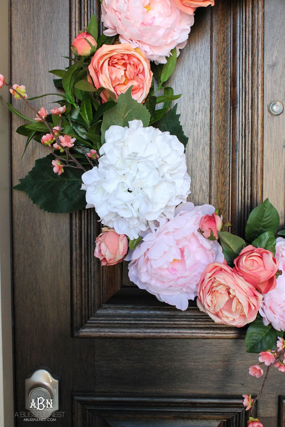 Easy steps to make this gorgeous peony flower wreath. #springwreath #diytutorial #flowerwreath #wreathtutorial