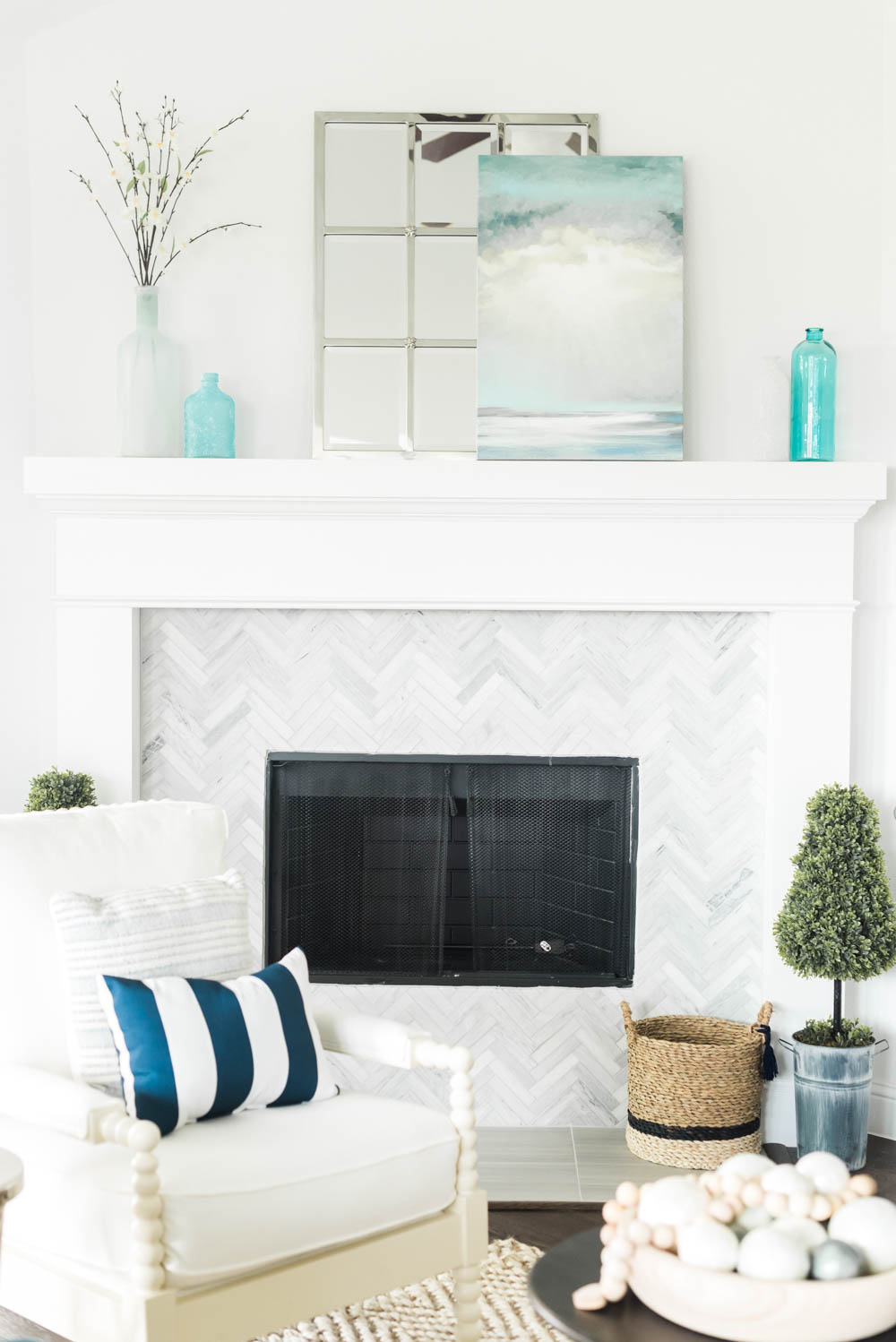 Beautiful coastal living room decor + sources to recreate this living room look. #coastaldecor #livingroomideas #ABlissfulNest #livingroom #coastalhomedecor