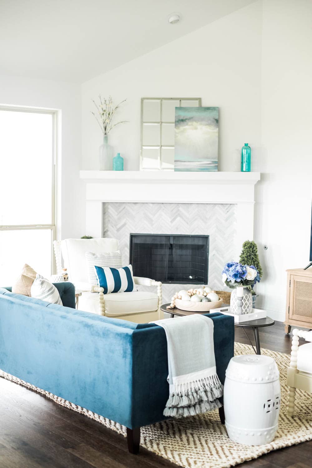 Beautiful coastal living room decor + sources to recreate this living room look. #coastaldecor #livingroomideas #ABlissfulNest #livingroom #coastalhomedecor