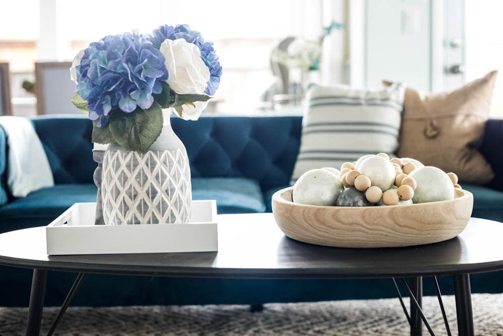 Beautiful coastal living room decor + sources to recreate this living room look. #coastaldecor #livingroomideas #ABlissfulNest #livingroom #coastalhomedecor