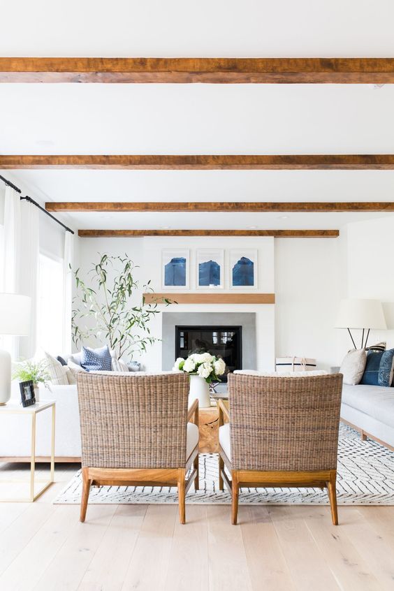 Just love the soothing color palette of this room design and those beams are incredible! #homedecor #livingroom #coastal 
