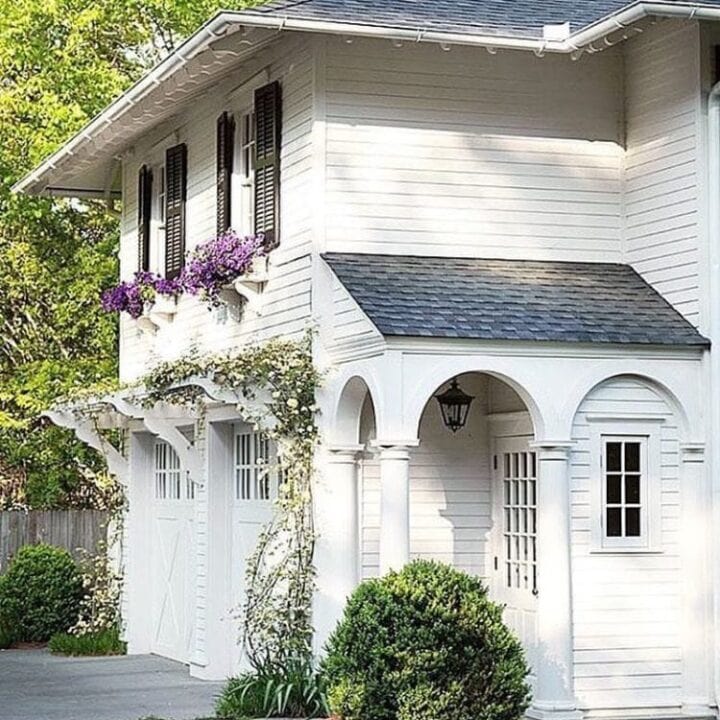 Just love the gorgeous arches of this white home.