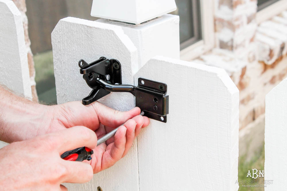 Follow our simple steps to recreate this dog gate for your own backyard with this essential gate kit from National Hardware. #ad #NationalHardware