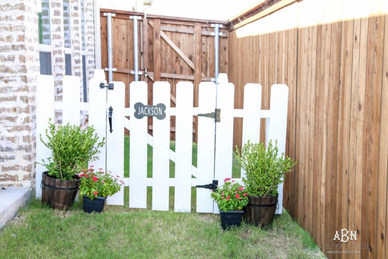 Follow our simple steps to recreate this dog gate for your own backyard with this essential gate kit from National Hardware. #ad #NationalHardware
