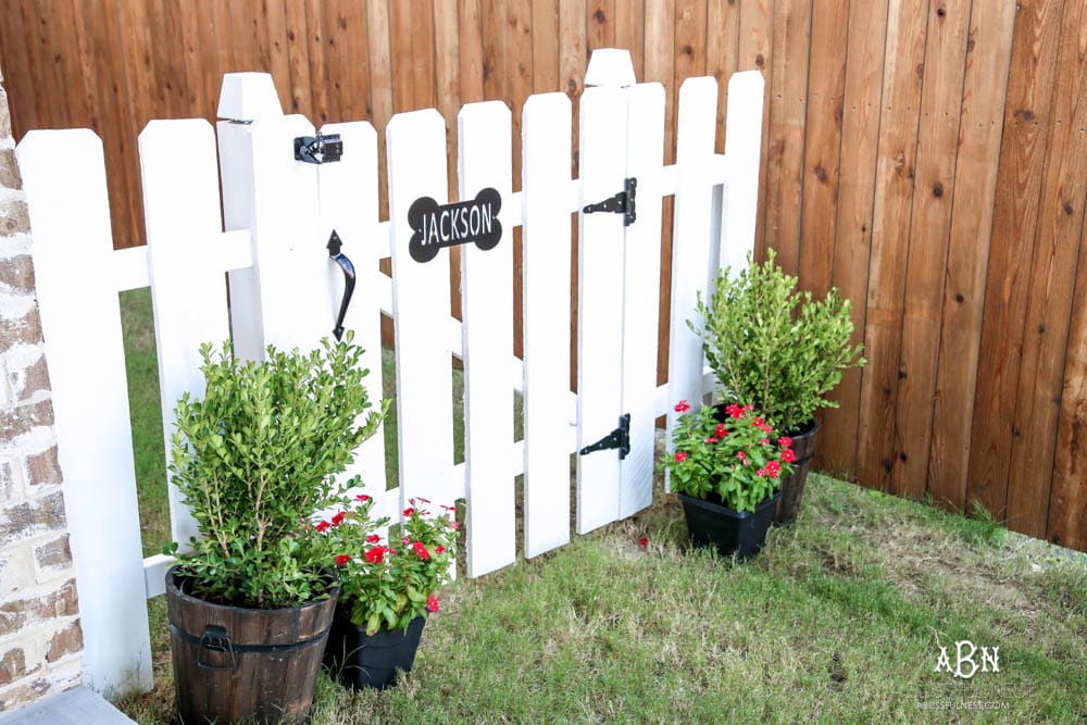 Follow our simple steps to recreate this dog gate for your own backyard with this essential gate kit from National Hardware. #ad #NationalHardware