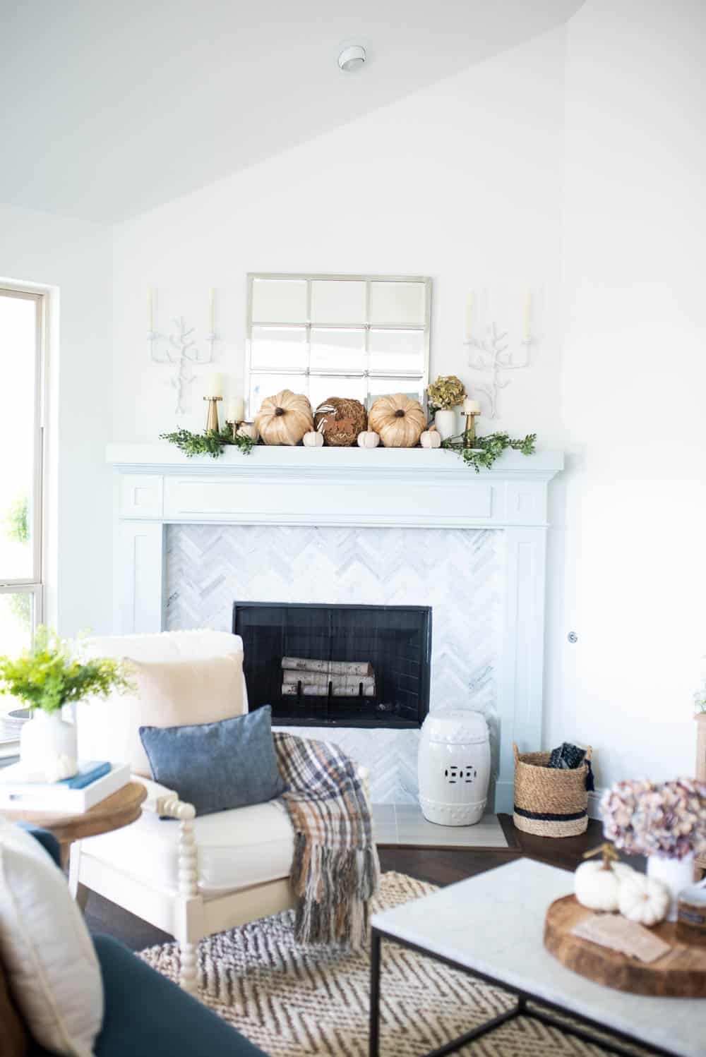 Beautiful neutral pops of fall decor and lots of texture in this fall living room home tour. #ABlissfulNest #falldecor #falldecorating #fallideas