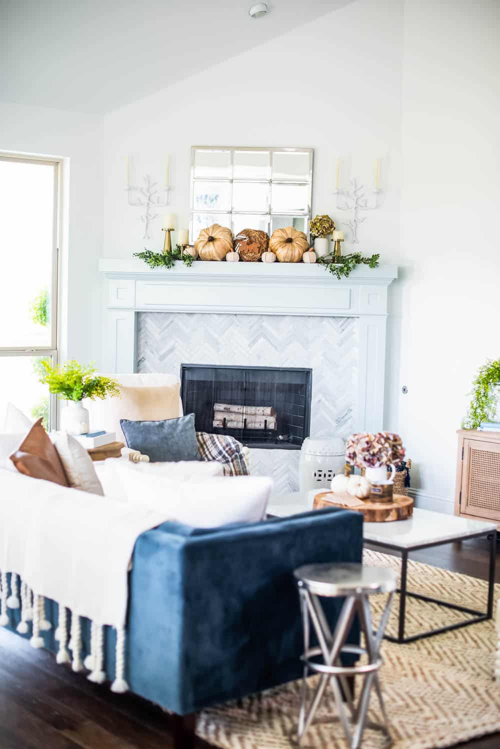 Beautiful neutral pops of fall decor and lots of texture in this fall living room home tour. #ABlissfulNest #falldecor #falldecorating #fallideas