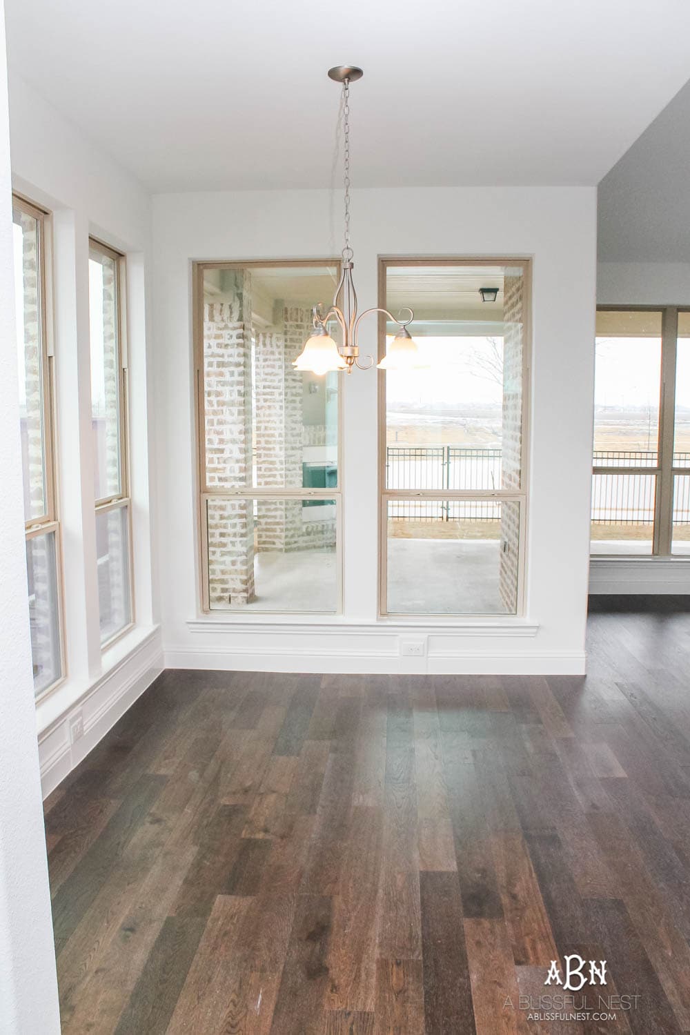 This is the simplest and easy way to install farmhouse barnwood on a ceiling! Just peel and stick these boards from Stikwood for a dramatic makeover to your plain ceiling or wall. More details on https://ablissfulnest.com #farmhousedecor #farmhouseproject #farmhousestyle #ad #stikwood