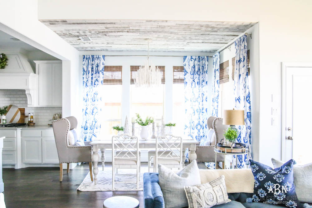 This is the simplest and easy way to install farmhouse barnwood on a ceiling! Just peel and stick these boards from Stikwood for a dramatic makeover to your plain ceiling or wall. More details on https://ablissfulnest.com #farmhousedecor #farmhouseproject #farmhousestyle #ad #stikwood