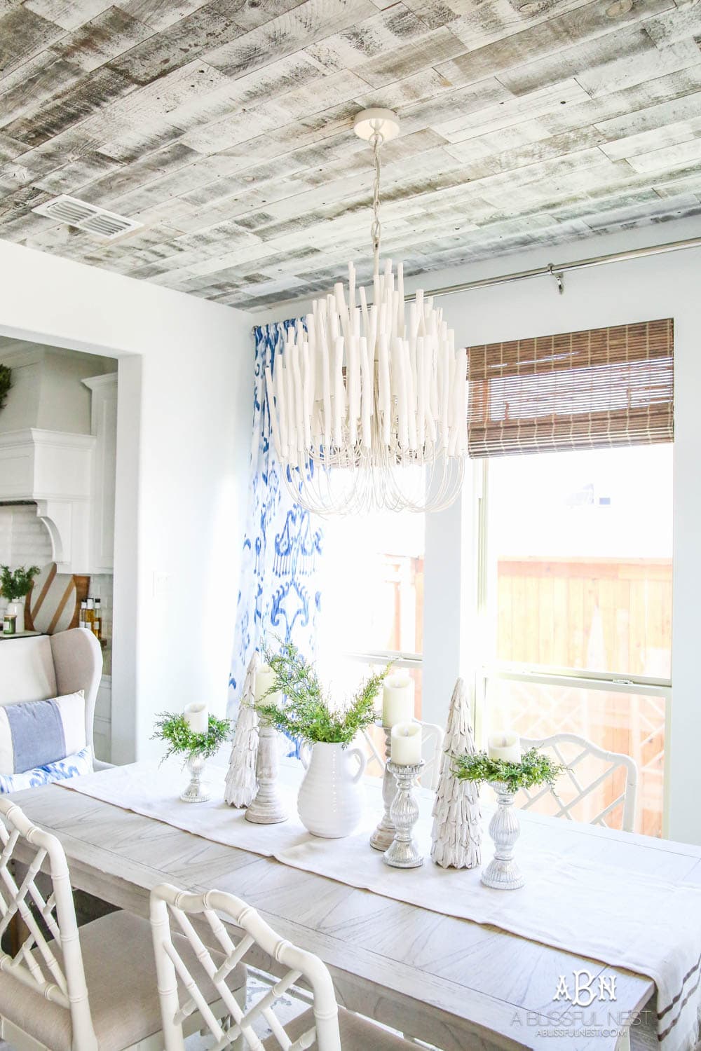 Blue and white breakfast room with coastal farmhouse style. All the sources + details in post! See more on https://ablissfulnest.com #ABlissfulNest #breakfastroom #designtips #diningroom 