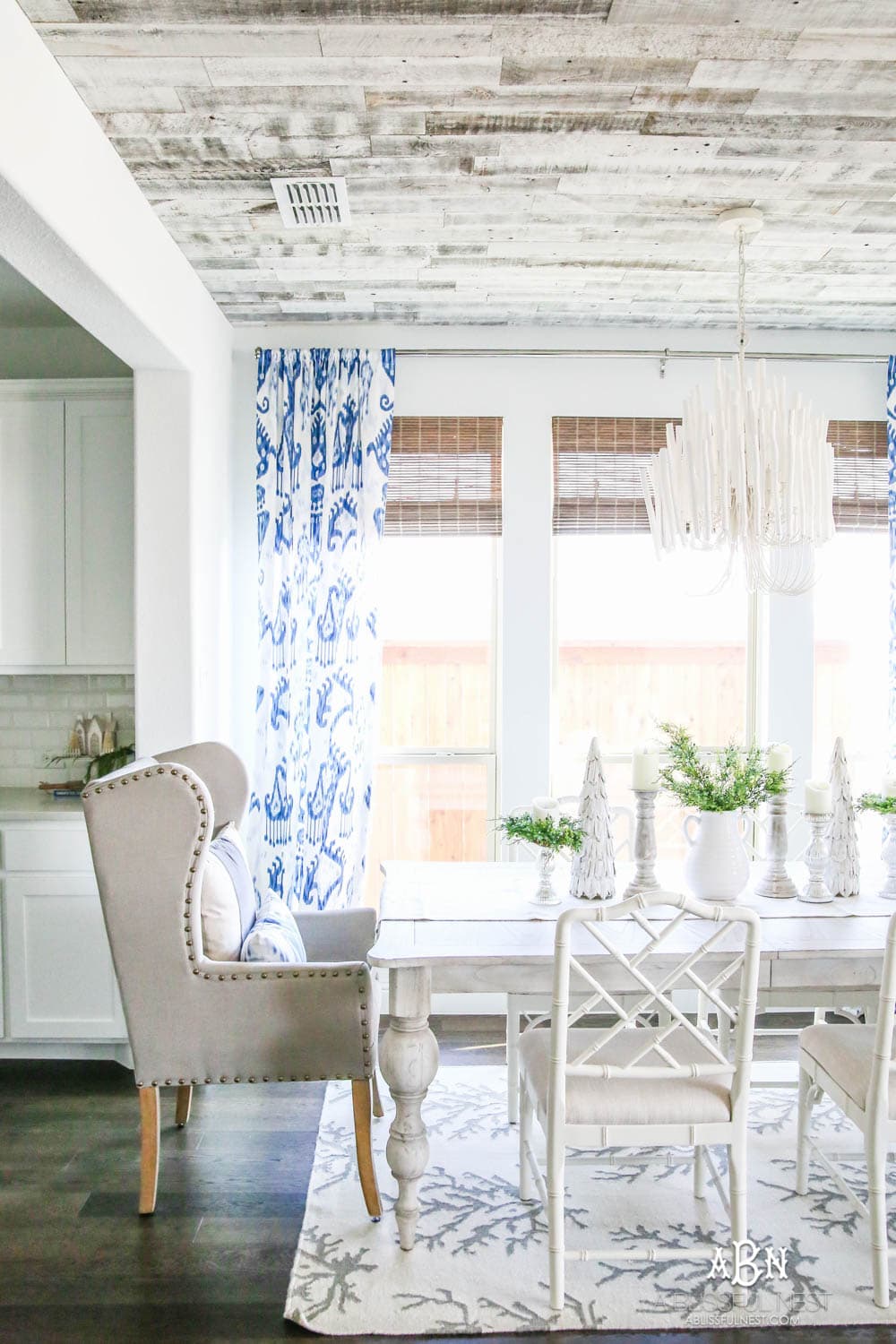 This is the simplest and easy way to install farmhouse barnwood on a ceiling! Just peel and stick these boards from Stikwood for a dramatic makeover to your plain ceiling or wall. More details on https://ablissfulnest.com #farmhousedecor #farmhouseproject #farmhousestyle #ad #stikwood