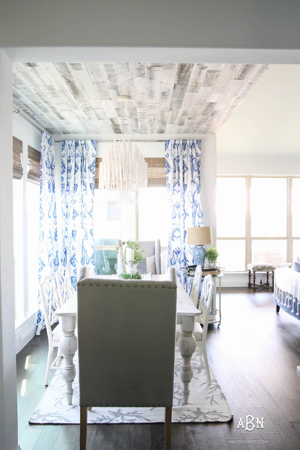 This is the simplest and easy way to install farmhouse barnwood on a ceiling! Just peel and stick these boards from Stikwood for a dramatic makeover to your plain ceiling or wall. More details on https://ablissfulnest.com #farmhousedecor #farmhouseproject #farmhousestyle #ad #stikwood