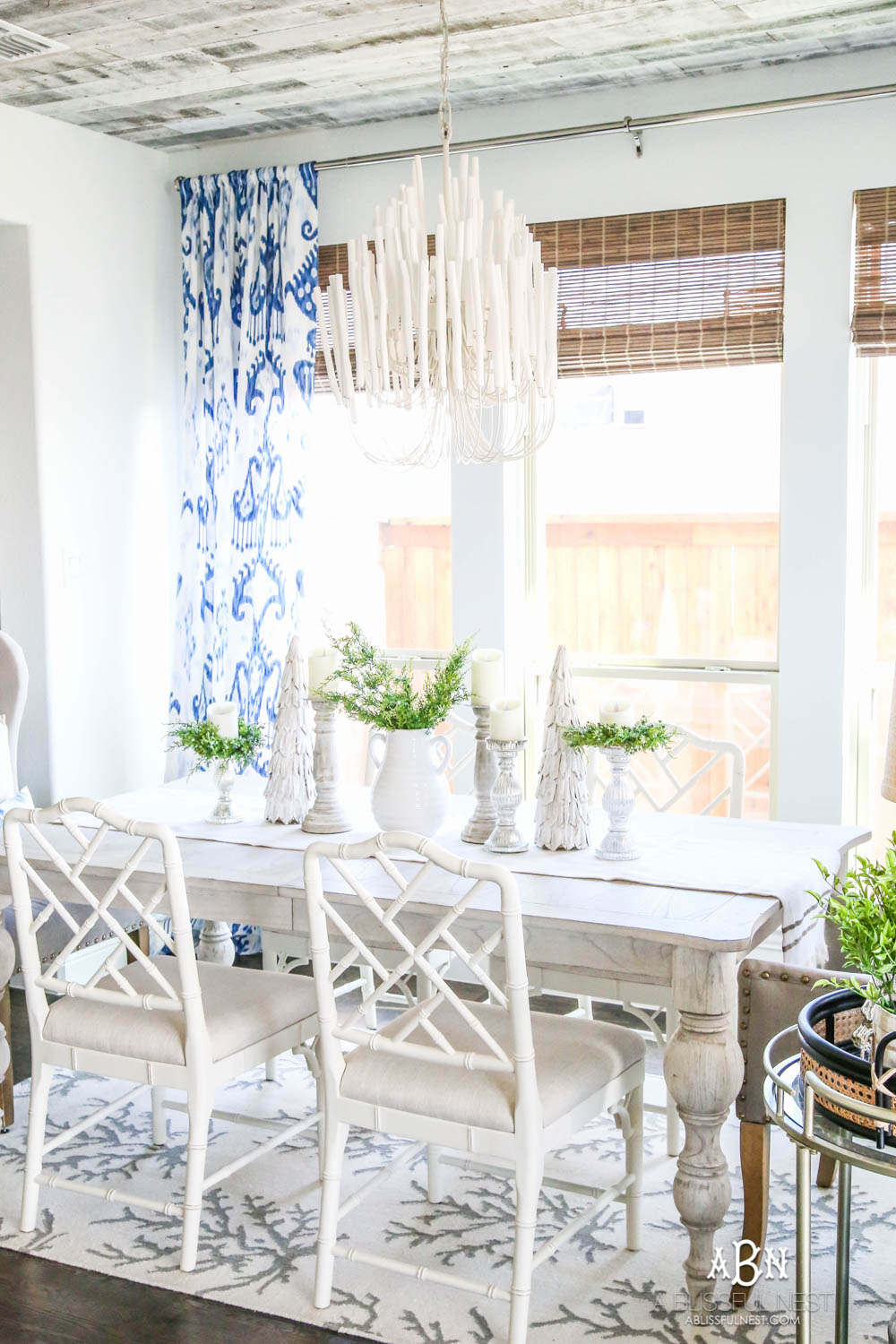 This is the simplest and easy way to install farmhouse barnwood on a ceiling! Just peel and stick these boards from Stikwood for a dramatic makeover to your plain ceiling or wall. More details on https://ablissfulnest.com #farmhousedecor #farmhouseproject #farmhousestyle #ad #stikwood