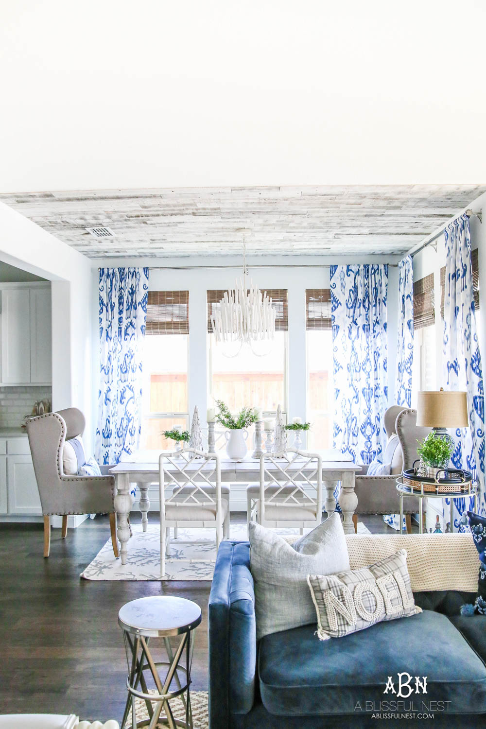 Blue and white breakfast room with coastal farmhouse style. All the sources + details in post! See more on https://ablissfulnest.com #ABlissfulNest #breakfastroom #designtips #diningroom 